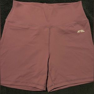 Aybl Women’s athletic shorts. Purple size large